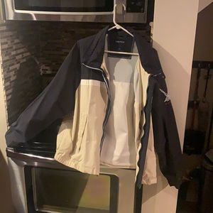 Nautica light weight jacket like new condition beige and blue.